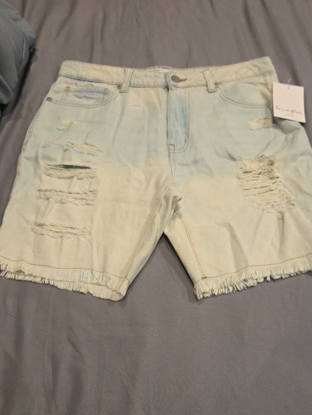 love, Fire Light Wash Denim Waistband Detail
